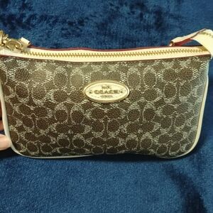 Coach Brown and Cream Clutch with Gold Accents